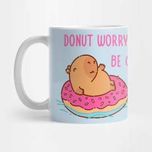 Capybara on a donut floater Mug